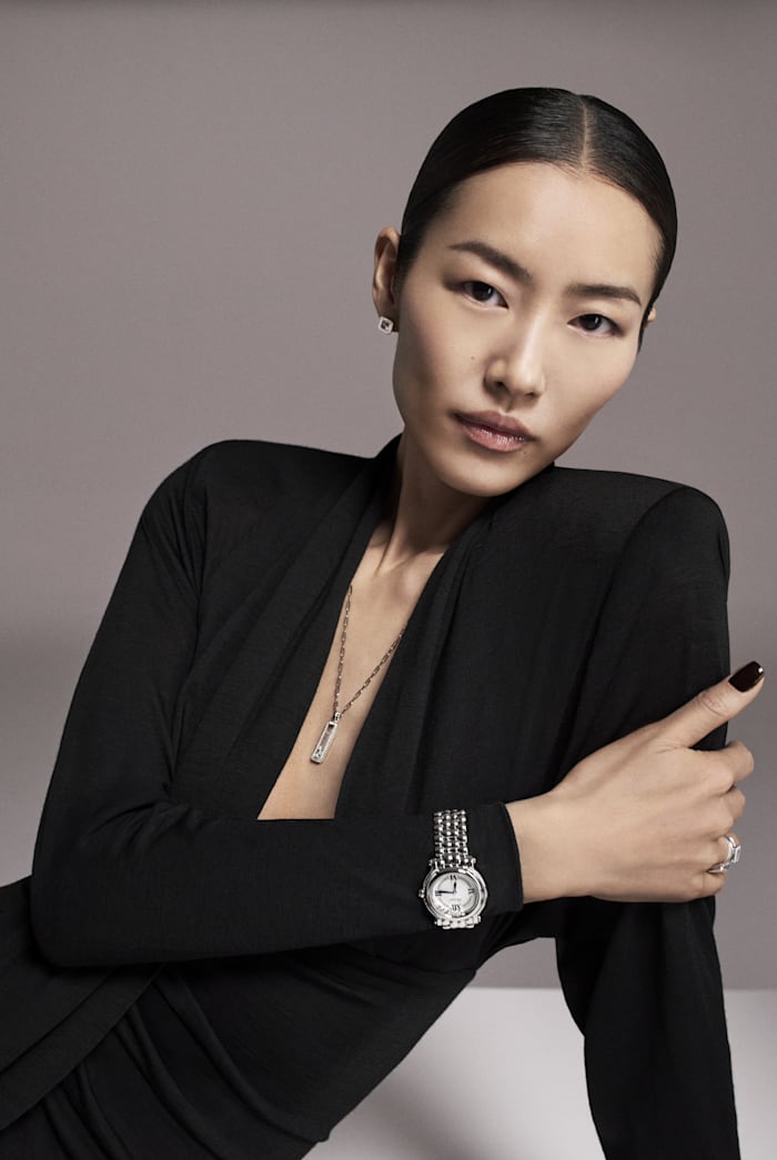 Liu Wen wearing a Happy Sport floating diamond watch