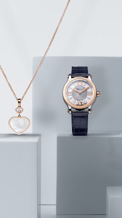 Woman with Happy Hearts gold bangles from Chopard