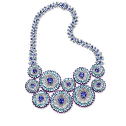 Close-up of a luxury necklace set with tanzanites, Paraiba tourmalines, amethysts and diamonds