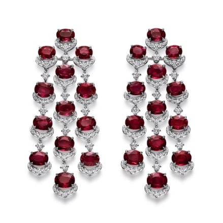 Close-up of ruby and diamond earrings