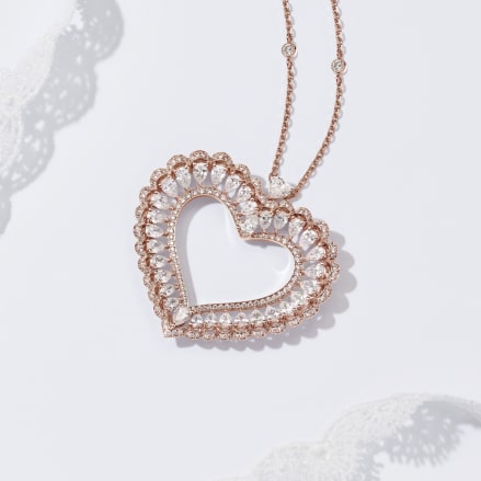 rose gold and diamond necklace, white gold and diamond earrings and necklac